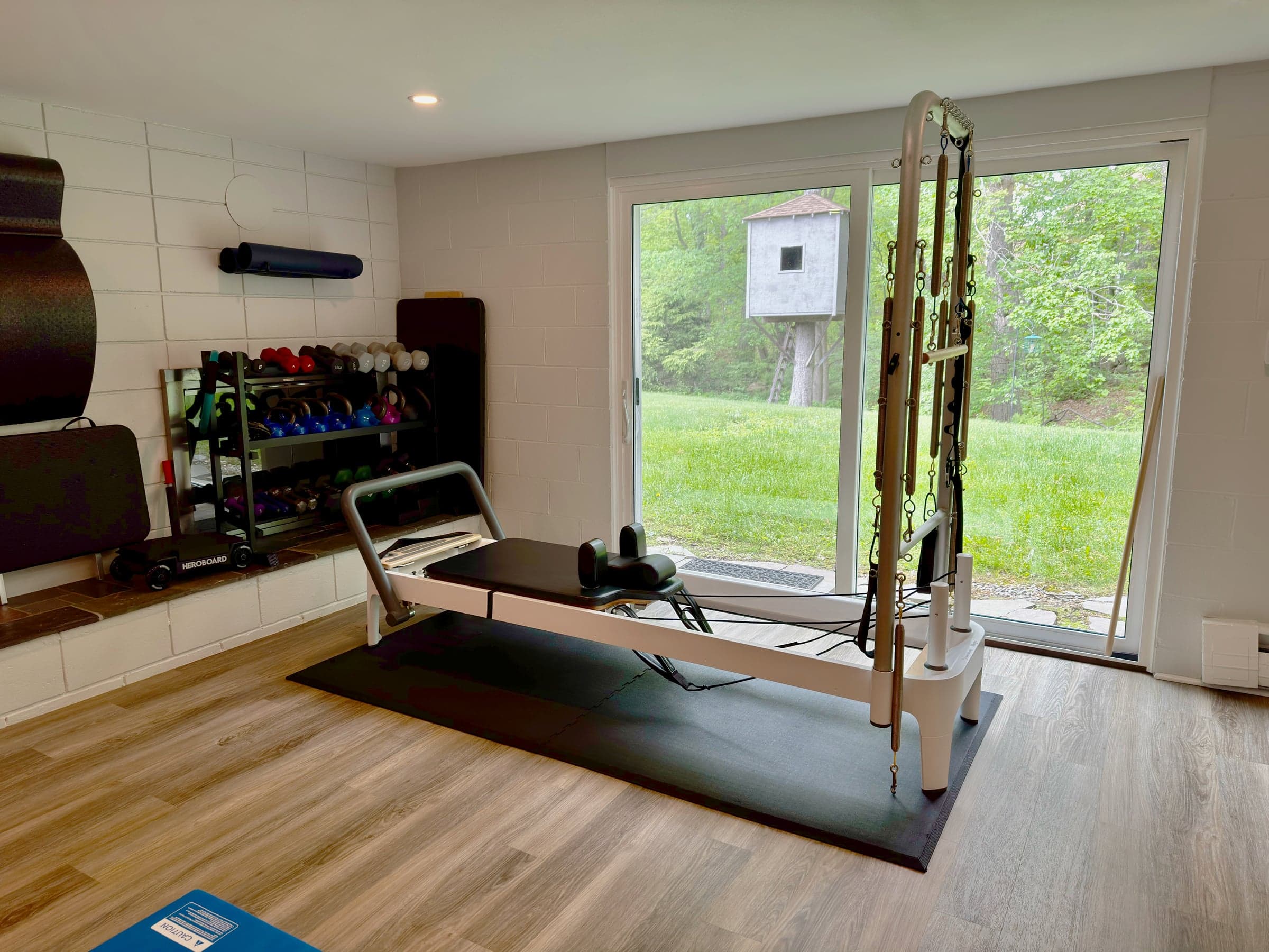 Studio · reformer + cadillac with the door open
